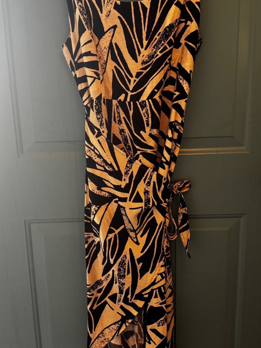 Sleeveless Black and Beige Leaf-Print Tulip Wrap Dress